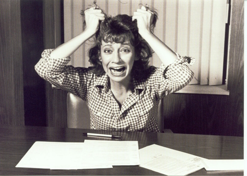 woman tearing hair out